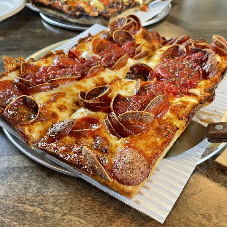 https://www.visitspartanburg.com/wp-content/uploads/2022/11/pi-squared-pizza.jpeg